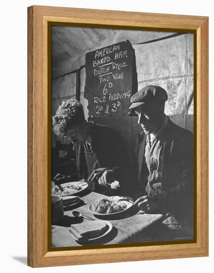 Two Men Eating American Food at a Liverpool Communal Feeding Centre-Hans Wild-Framed Premier Image Canvas