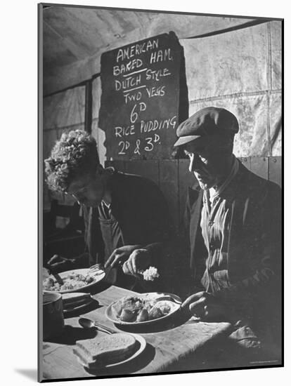 Two Men Eating American Food at a Liverpool Communal Feeding Centre-Hans Wild-Mounted Photographic Print