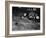 Two Men Lying on the Floor, Constructing a Railroad, at Toy Train Society-Alfred Eisenstaedt-Framed Photographic Print