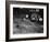 Two Men Lying on the Floor, Constructing a Railroad, at Toy Train Society-Alfred Eisenstaedt-Framed Photographic Print