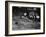 Two Men Lying on the Floor, Constructing a Railroad, at Toy Train Society-Alfred Eisenstaedt-Framed Photographic Print