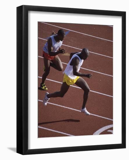 Two Men Racing on a Track-null-Framed Photographic Print