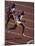 Two Men Racing on a Track-null-Mounted Photographic Print