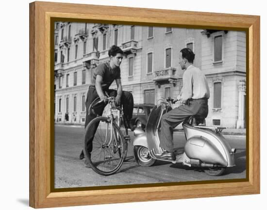 Two Men Talking in Street with Vespa Scooter and Bicycle-Dmitri Kessel-Framed Premier Image Canvas