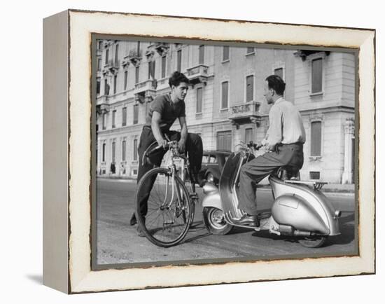 Two Men Talking in Street with Vespa Scooter and Bicycle-Dmitri Kessel-Framed Premier Image Canvas