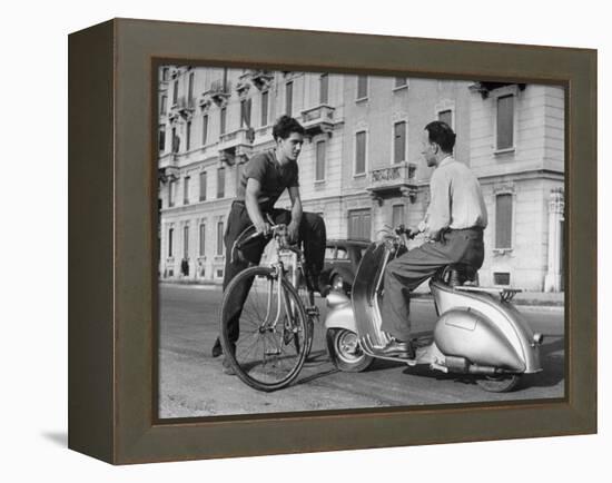 Two Men Talking in Street with Vespa Scooter and Bicycle-Dmitri Kessel-Framed Premier Image Canvas