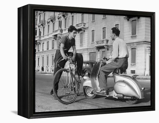 Two Men Talking in Street with Vespa Scooter and Bicycle-Dmitri Kessel-Framed Premier Image Canvas