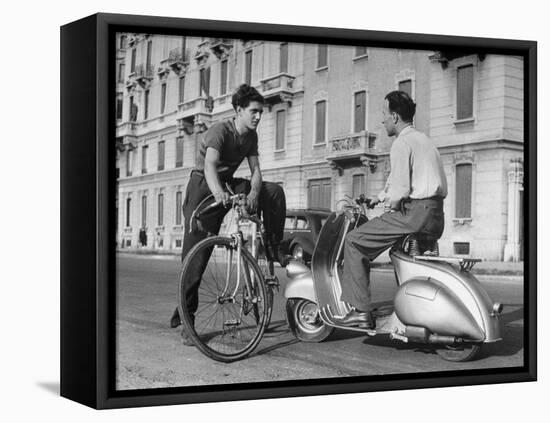 Two Men Talking in Street with Vespa Scooter and Bicycle-Dmitri Kessel-Framed Premier Image Canvas