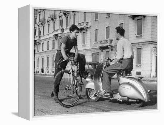 Two Men Talking in Street with Vespa Scooter and Bicycle-Dmitri Kessel-Framed Premier Image Canvas