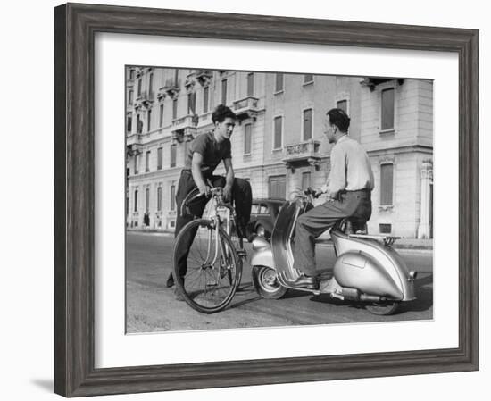 Two Men Talking in Street with Vespa Scooter and Bicycle-Dmitri Kessel-Framed Photographic Print