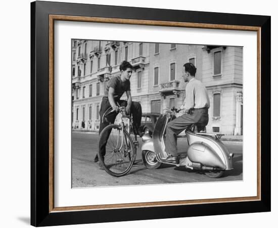 Two Men Talking in Street with Vespa Scooter and Bicycle-Dmitri Kessel-Framed Photographic Print