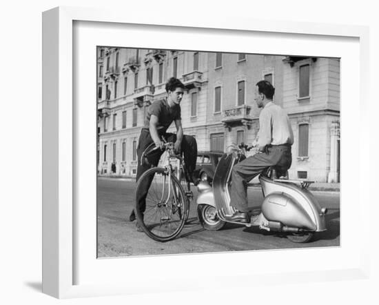 Two Men Talking in Street with Vespa Scooter and Bicycle-Dmitri Kessel-Framed Photographic Print