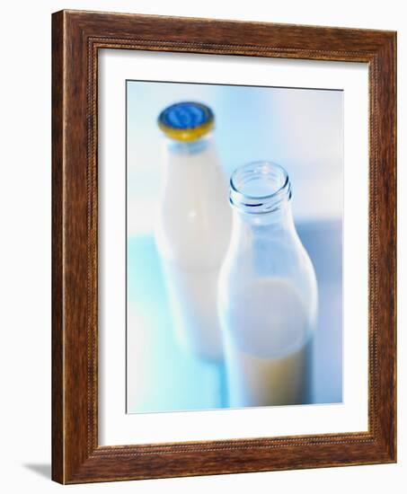 Two Milk Bottles, One Opened-Klaus Arras-Framed Photographic Print