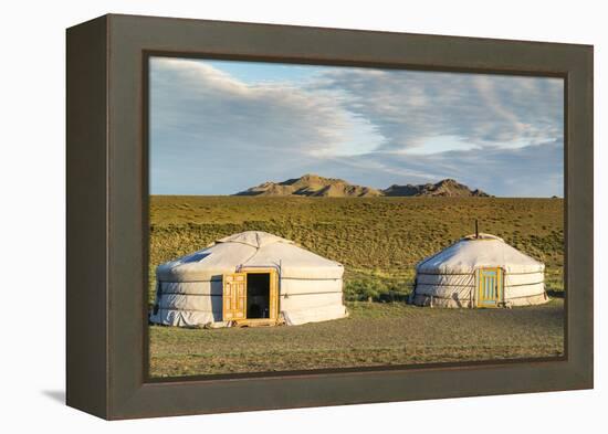 Two Mongolian nomadic gers and mountains in the background, Bayandalai district, South Gobi provinc-Francesco Vaninetti-Framed Premier Image Canvas