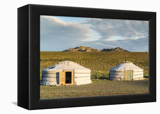 Two Mongolian nomadic gers and mountains in the background, Bayandalai district, South Gobi provinc-Francesco Vaninetti-Framed Premier Image Canvas