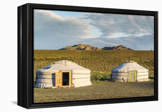 Two Mongolian nomadic gers and mountains in the background, Bayandalai district, South Gobi provinc-Francesco Vaninetti-Framed Premier Image Canvas