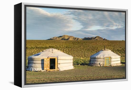 Two Mongolian nomadic gers and mountains in the background, Bayandalai district, South Gobi provinc-Francesco Vaninetti-Framed Premier Image Canvas