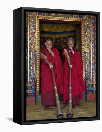 Two Monks Blow Long Horns Called Dung-Chen, at the Temple of Wangdue Phodrang Dzong (Fortress)-Nigel Pavitt-Framed Premier Image Canvas