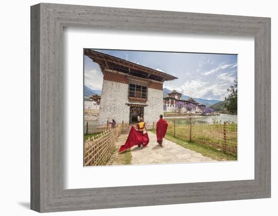 Two Monks Dressed in Traditional Red Access the Punakha Dzong, Punakha-Roberto Moiola-Framed Photographic Print