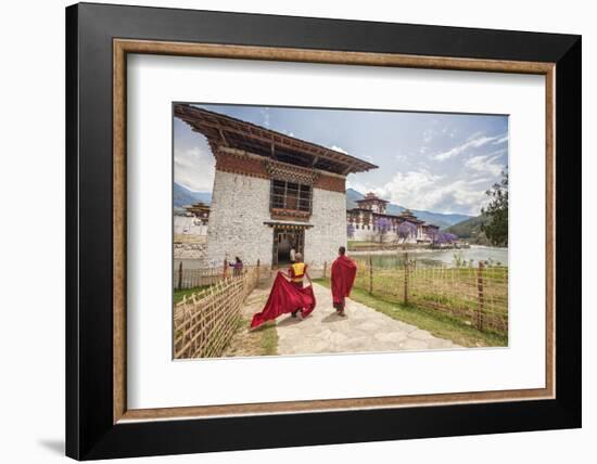 Two Monks Dressed in Traditional Red Access the Punakha Dzong, Punakha-Roberto Moiola-Framed Photographic Print