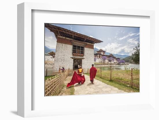 Two Monks Dressed in Traditional Red Access the Punakha Dzong, Punakha-Roberto Moiola-Framed Photographic Print