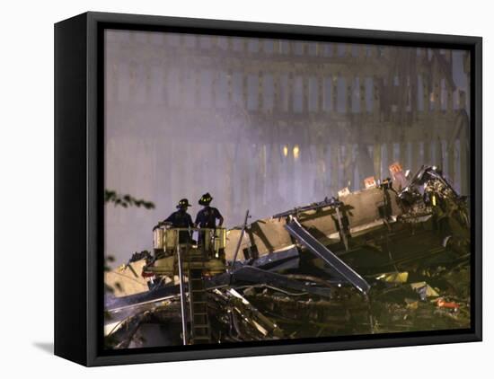 Two New York Firefighters View the Smoldering Rubble-null-Framed Premier Image Canvas