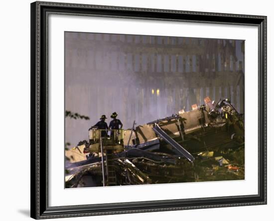 Two New York Firefighters View the Smoldering Rubble-null-Framed Photographic Print
