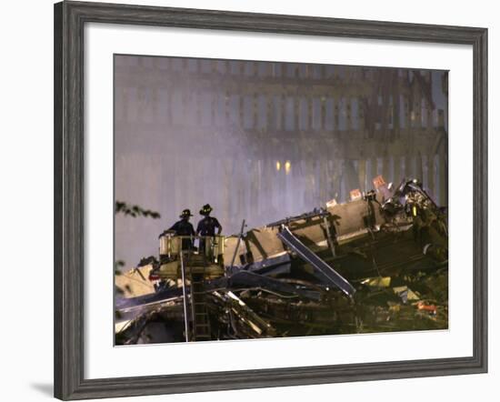 Two New York Firefighters View the Smoldering Rubble-null-Framed Photographic Print