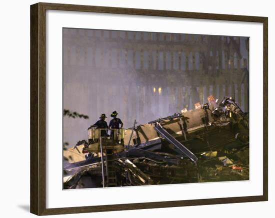 Two New York Firefighters View the Smoldering Rubble-null-Framed Photographic Print