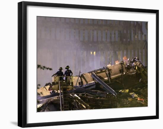 Two New York Firefighters View the Smoldering Rubble-null-Framed Photographic Print