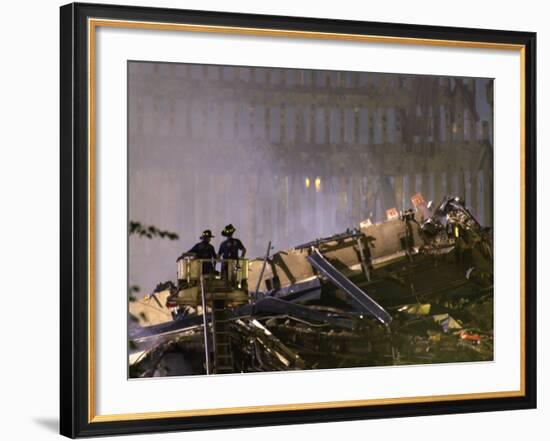 Two New York Firefighters View the Smoldering Rubble-null-Framed Photographic Print