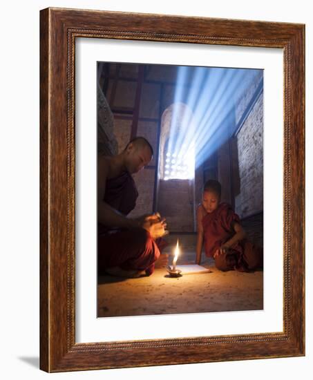 Two Novice Monks Reading Buddhist Texts Inside a Pagoda at Bagan in the Country of Burma (Myanmar)-Kyle Hammons-Framed Photographic Print