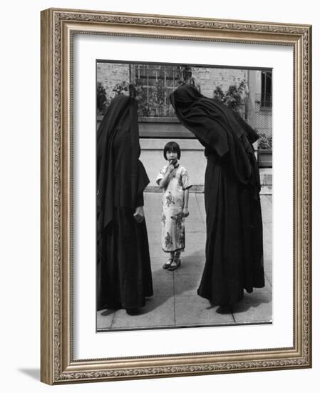 Two Nuns Questioning a Little Chinese Girl at the American Mission School-Alfred Eisenstaedt-Framed Photographic Print
