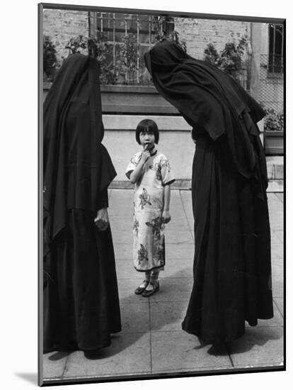 Two Nuns Questioning a Little Chinese Girl at the American Mission School-Alfred Eisenstaedt-Mounted Photographic Print