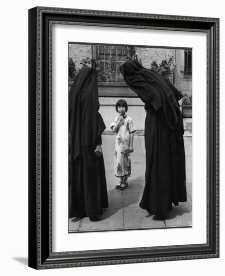 Two Nuns Questioning a Little Chinese Girl at the American Mission School-Alfred Eisenstaedt-Framed Photographic Print