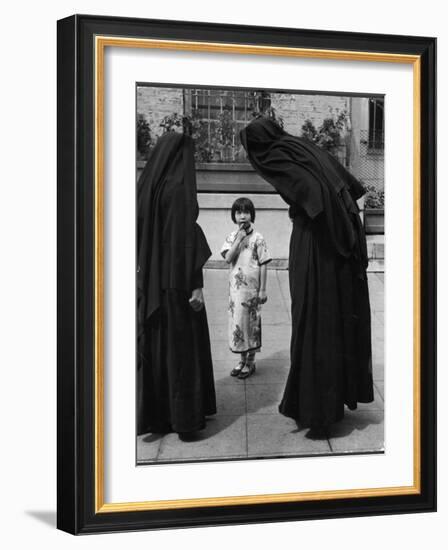 Two Nuns Questioning a Little Chinese Girl at the American Mission School-Alfred Eisenstaedt-Framed Photographic Print