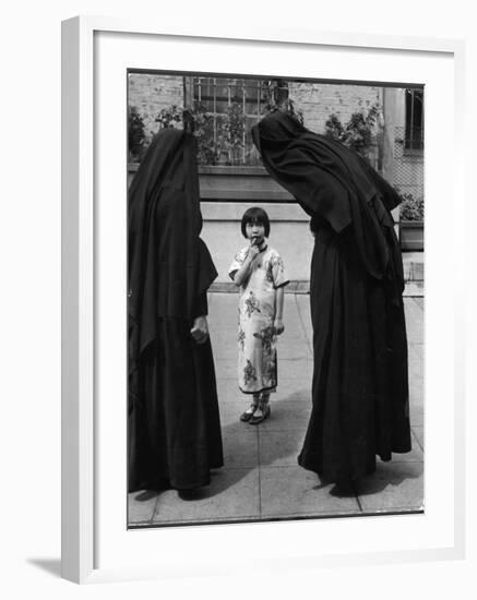 Two Nuns Questioning a Little Chinese Girl at the American Mission School-Alfred Eisenstaedt-Framed Photographic Print