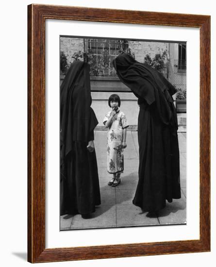 Two Nuns Questioning a Little Chinese Girl at the American Mission School-Alfred Eisenstaedt-Framed Photographic Print