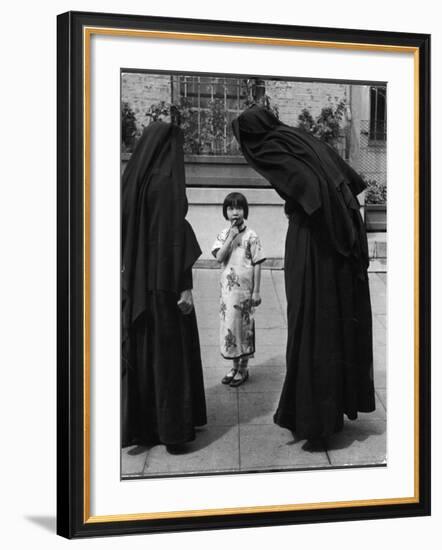 Two Nuns Questioning a Little Chinese Girl at the American Mission School-Alfred Eisenstaedt-Framed Photographic Print