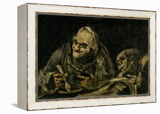 Two Old Men Eating Soup-Francisco de Goya-Framed Premier Image Canvas