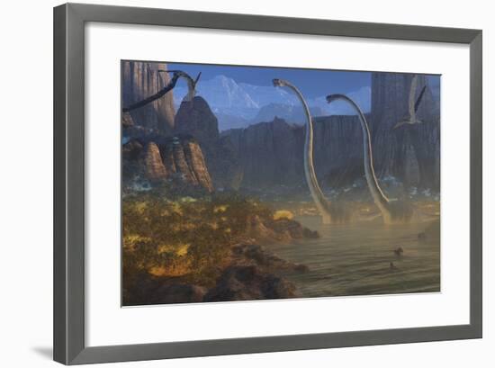 Two Omeisaurus Dinosaurs Crossing an Inlet with Flying Pterosaurs Flying Above-Stocktrek Images-Framed Art Print