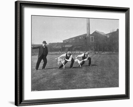 Two Owners Demonstrate How Whippets are Started in a Race : This Is known as 'Flapping'-null-Framed Photographic Print