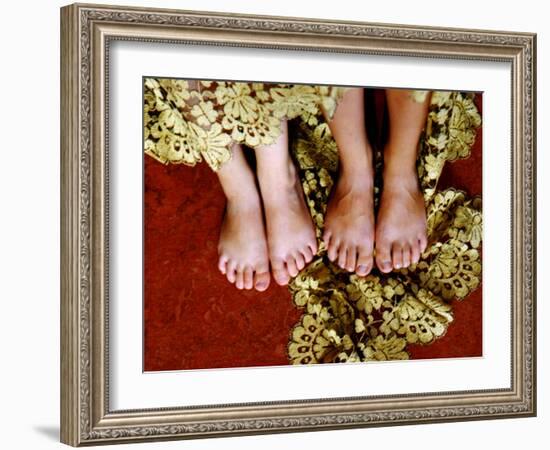 Two Pair of Feet of Small Children with Textile Spread around Them-Winfred Evers-Framed Photographic Print