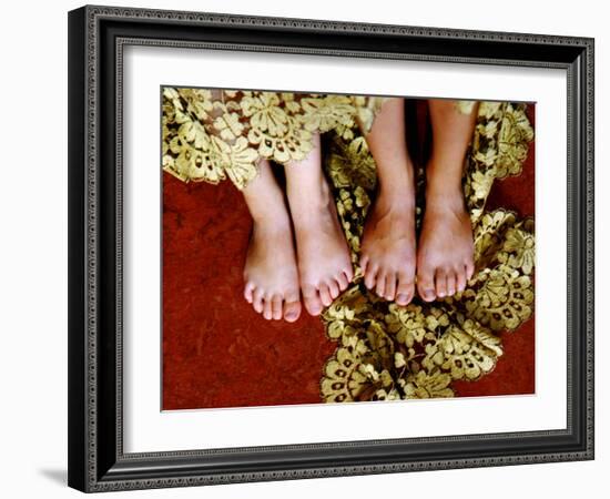 Two Pair of Feet of Small Children with Textile Spread around Them-Winfred Evers-Framed Photographic Print