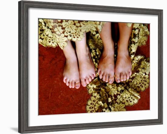 Two Pair of Feet of Small Children with Textile Spread around Them-Winfred Evers-Framed Photographic Print