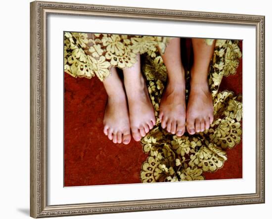 Two Pair of Feet of Small Children with Textile Spread around Them-Winfred Evers-Framed Photographic Print