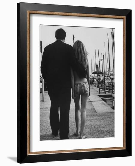 Two People at the Cannes Film Festival-Paul Schutzer-Framed Photographic Print