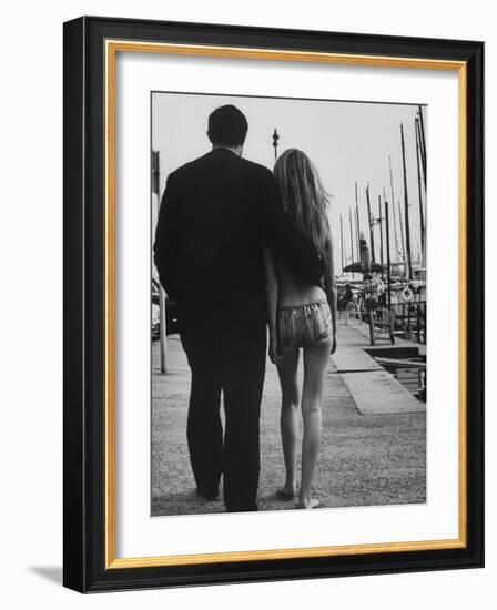 Two People at the Cannes Film Festival-Paul Schutzer-Framed Photographic Print