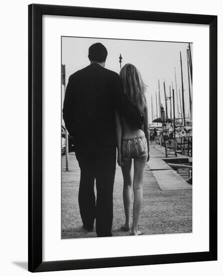 Two People at the Cannes Film Festival-Paul Schutzer-Framed Photographic Print