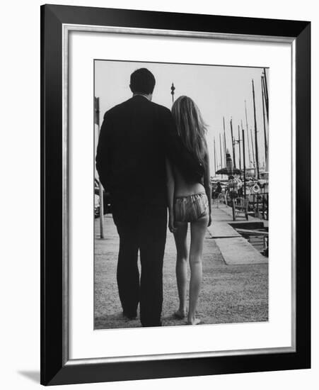 Two People at the Cannes Film Festival-Paul Schutzer-Framed Photographic Print